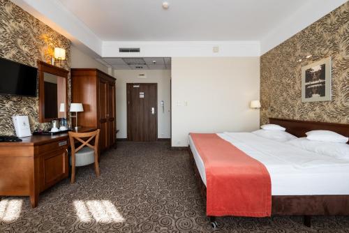 Кровать или кровати в номере Hotel Esperanto