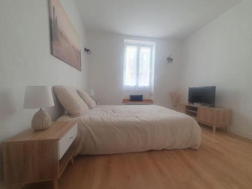 Μια τηλεόραση ή/και κέντρο ψυχαγωγίας στο Appartement central