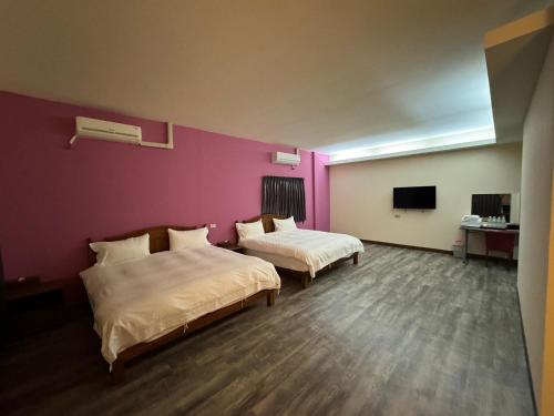 Postel nebo postele na pokoji v ubytování Lin Tea B&B