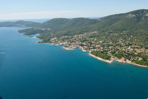 an aerial view of a large body of water at House ROSSELLA with cozy apartment and rooms close to the beach in Nerezine