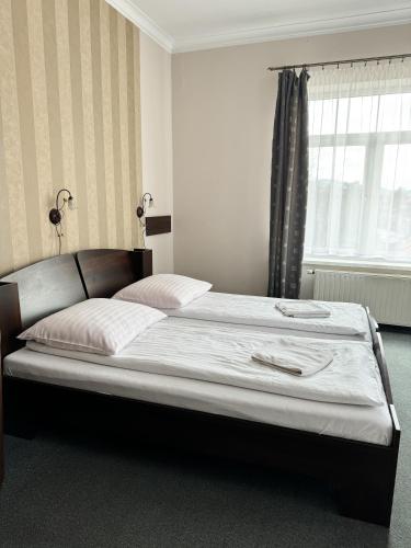 Letto o letti in una camera di Villa Carmen