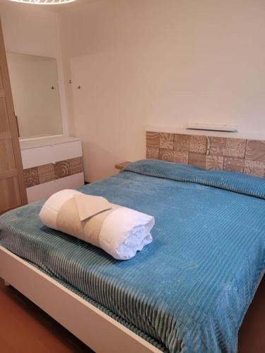 Ein Bett oder Betten in einem Zimmer der Unterkunft Casa Mia Tranquillo e accogliente
