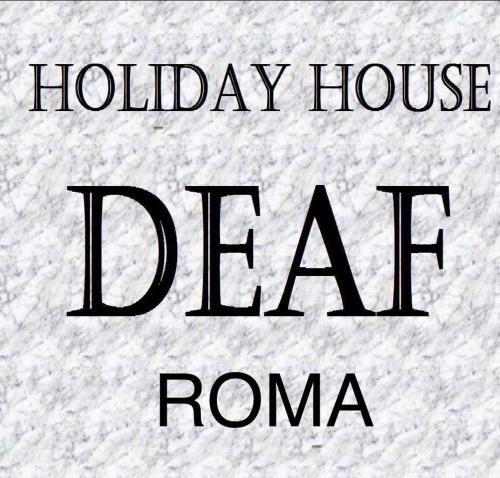 ein Schild, das das Ferienhaus iraq raoma liest in der Unterkunft Vacanze Deaf in Rom