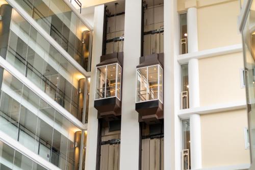 a view of the side of a building with balconies at Solna Park & Hotel in Solna