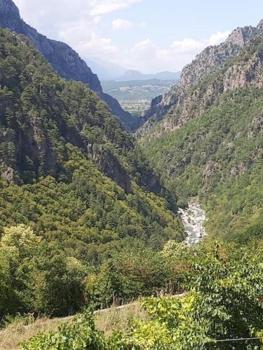 a view of a mountain valley with a river at Casa Di Munti in Konitsa