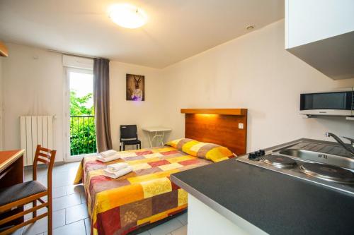 Η κουζίνα ή μικρή κουζίνα στο Appart Hotel Corte HR