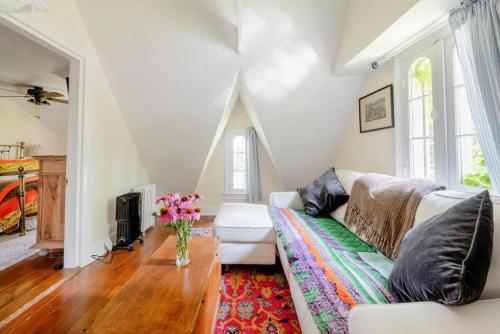 a living room with a couch and a table at The Gables of Rhinebeck in Rhinebeck