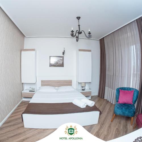 Ένα ή περισσότερα κρεβάτια σε δωμάτιο στο Hotel Apollonia