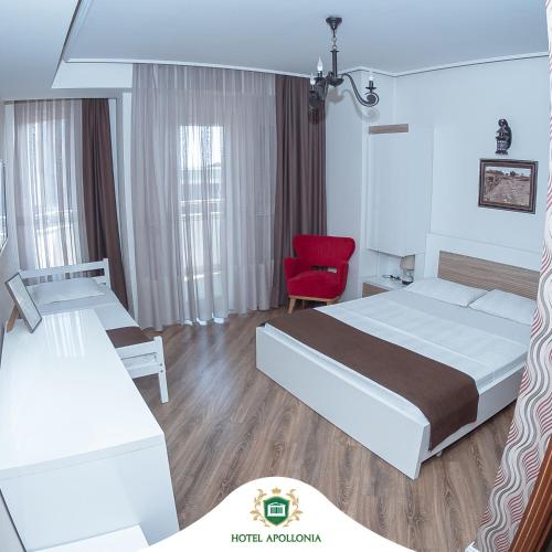 Ένα ή περισσότερα κρεβάτια σε δωμάτιο στο Hotel Apollonia