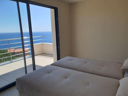 Ένα ή περισσότερα κρεβάτια σε δωμάτιο στο Villa de soleil à Cerbère,