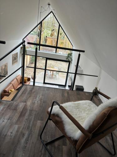 Zona de estar de B&B Sint-Mariaburg