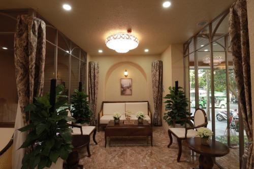Zona de estar de Maya Hotel 4