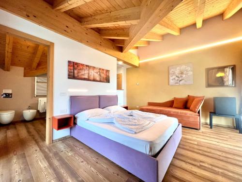 Ένα ή περισσότερα κρεβάτια σε δωμάτιο στο B&B dalla fattoria della Patty