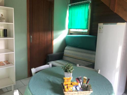Ένα ή περισσότερα κρεβάτια σε δωμάτιο στο Cabanas São Miguel