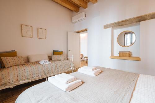 Ένα ή περισσότερα κρεβάτια σε δωμάτιο στο Preciosa Casa Renovada Centro Histórico 11 personas