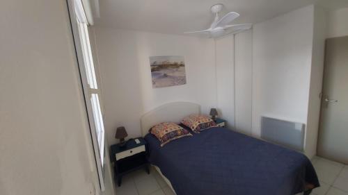 Postel nebo postele na pokoji v ubytování Beau T2, très calme, 3*, première ligne de la Marina Canet en Roussillon