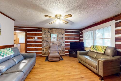 a living room with a couch and a ceiling fan at 2 Bed 2 Bath Vacation home in Whittier II in Whittier