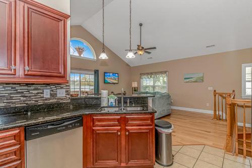 a kitchen with a sink and a dishwasher at Spacious 4 Bedroom House-2 Blocks From the Ocean-2185 Sanibel Court! in Myrtle Beach
