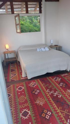 Postel nebo postele na pokoji v ubytování Puerta al Mar Ecolodge Glamping