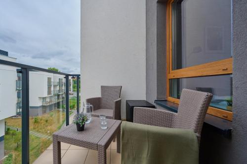 En balkong eller terrasse på Stylish Apartment Na Grobli with Balcony by Renters