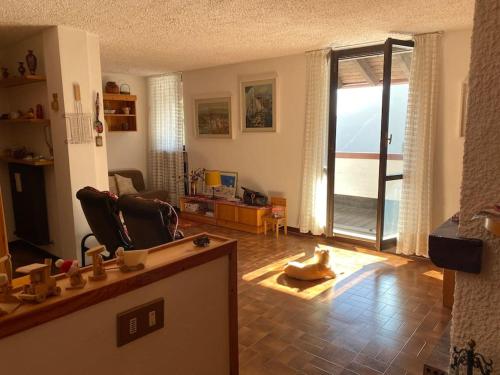 a living room with a view of a living room at Casa Polly a Saint Rhemy En Bosses in Saint-Rhémy-en-bosses