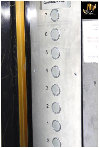 a close up of a television remote control at Hotel el Duque Internacional, Bogotá in Bogotá