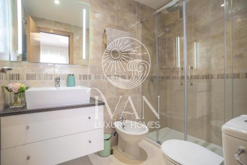 Kúpeľňa v ubytovaní Casa Rafael Ivan Luxury Homes 11ªPlta Sur 1ªLínea