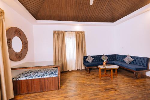 Posezení v ubytování Elixir Woods Luxury Resort And Spa, Munnar