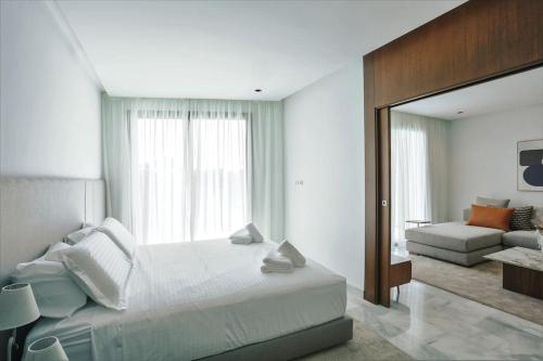 Ένα ή περισσότερα κρεβάτια σε δωμάτιο στο Résidence B Livin - Oasis