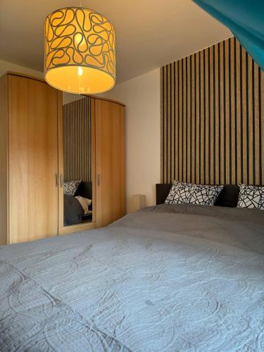 Katil atau katil-katil dalam bilik di Ferienwohnung Lohfelden Vibes