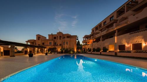 a swimming pool in the middle of a building at Royal Marbella Golf Resort in Estepona