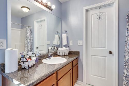 a bathroom with a sink and a mirror at Fayetteville Vacation Rental about 24 Mi to Atlanta! in Fayetteville