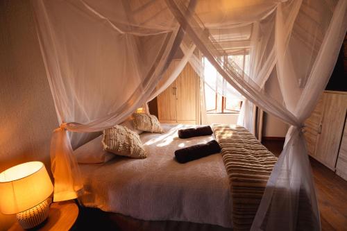 A bed or beds in a room at Bushveld Jewel - Close to Kruger