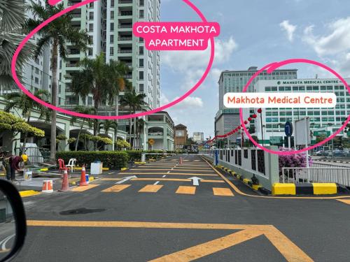 a view of a street in a city with pink circles at Costa Mahkota - 1min I Mahkota Parade Mall I Dataran Pahlawan I Mahkota Hospital in Melaka