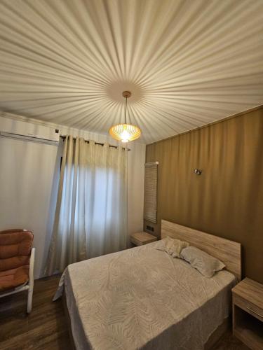 Ένα ή περισσότερα κρεβάτια σε δωμάτιο στο AP Villa Tourist Residence 16467