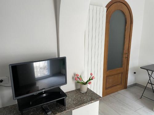 TV a/nebo společenská místnost v ubytování La casa di Rosetta