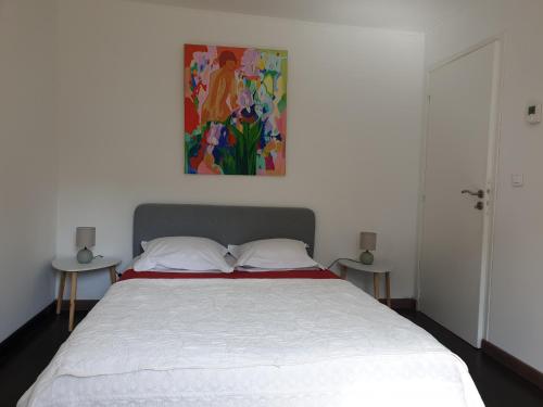 Postel nebo postele na pokoji v ubytování Maison calme et verdure