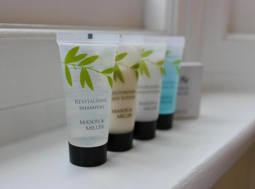 a row of four products sitting on a shelf at Wethele Manor in Leamington Spa