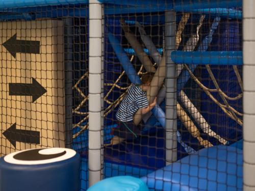 a person in a cage in a pool at Rosevia Resort & Spa in Jastrzębia Góra
