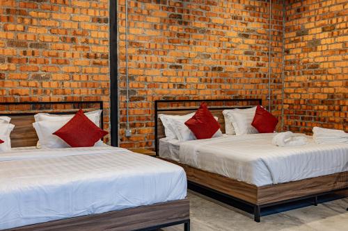 Postel nebo postele na pokoji v ubytování Sebayu Retreat Gopeng