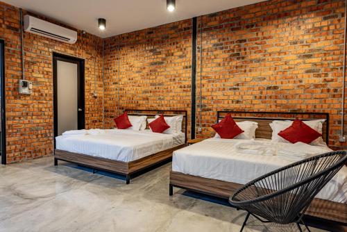 Postel nebo postele na pokoji v ubytování Sebayu Retreat Gopeng