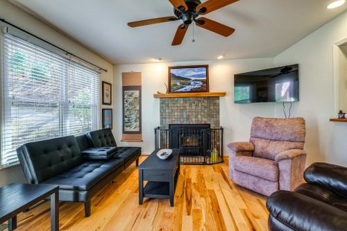 a living room with a couch and a chair at Pet-Friendly Roanoke Home with Fire Pit and Grill! in Roanoke