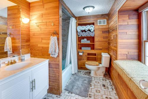 a bathroom with a toilet and a shower and a sink at 7 Mi to Newark Montclair Vacation Rental in Montclair