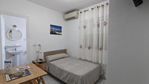 Postel nebo postele na pokoji v ubytování La Obrera