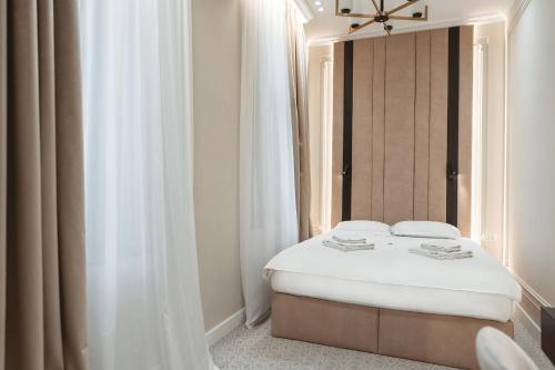 Katil atau katil-katil dalam bilik di Astoria Grand Hotel