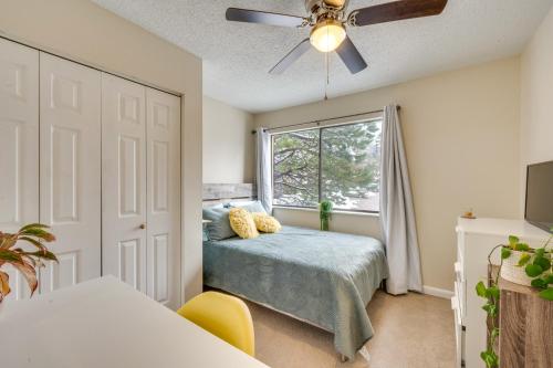 a bedroom with a bed and a window at Beautiful Boulder Townhome Walk to CU and Pearl St! in Boulder