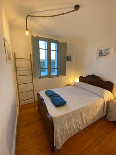 Ένα ή περισσότερα κρεβάτια σε δωμάτιο στο Casa de las Ascuas