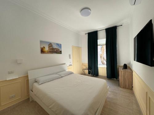 Postel nebo postele na pokoji v ubytování Costantino Rooms