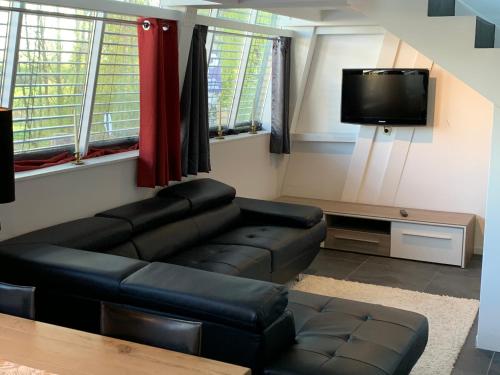 A seating area at Apartments mit eigenem Charme in Meersburg