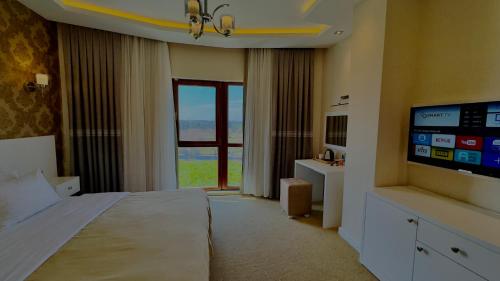 TV o dispositivi per l'intrattenimento presso Green Roof Boutique Hotel & SPA Istanbul Airport